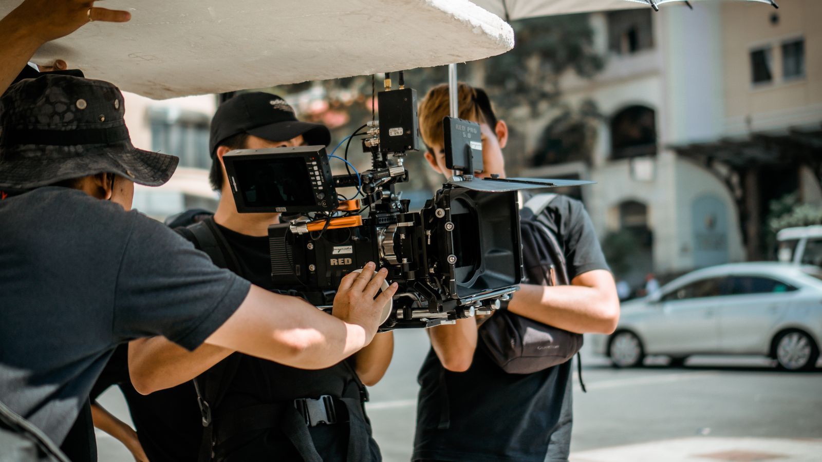 A film crew shooting on a city street